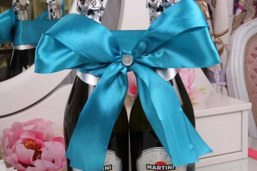 Бирюзовый бант на шампанское от  2