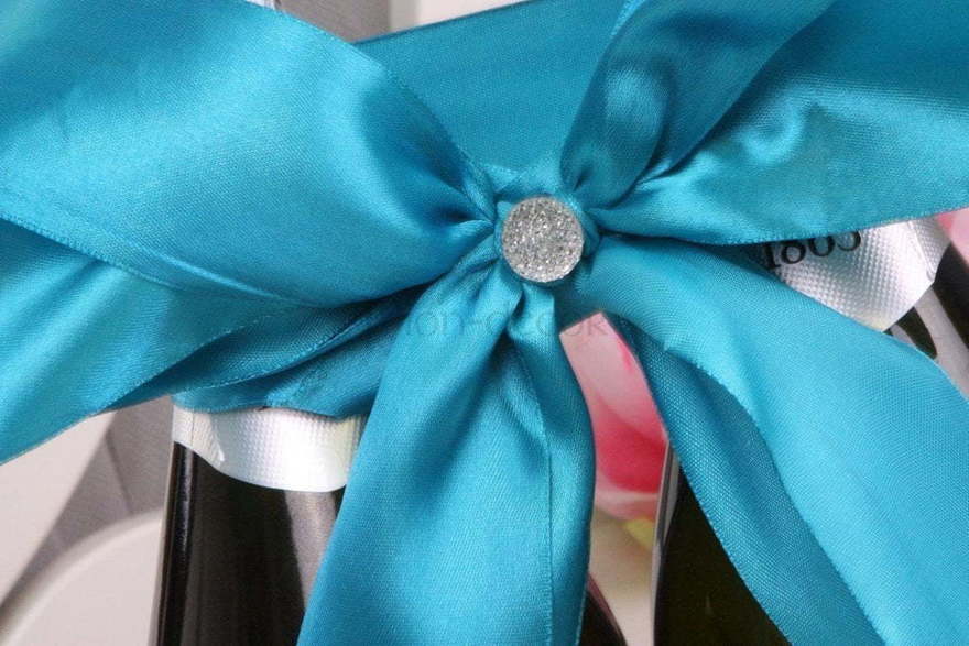 Бирюзовый бант на шампанское от  3