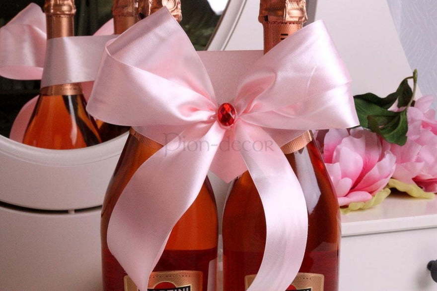 Нежно розовый бант на шампанское от  2