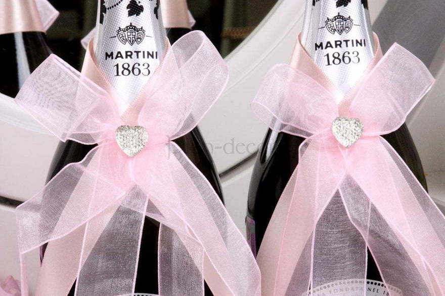 Розовые ленты на шампаснкое от  2