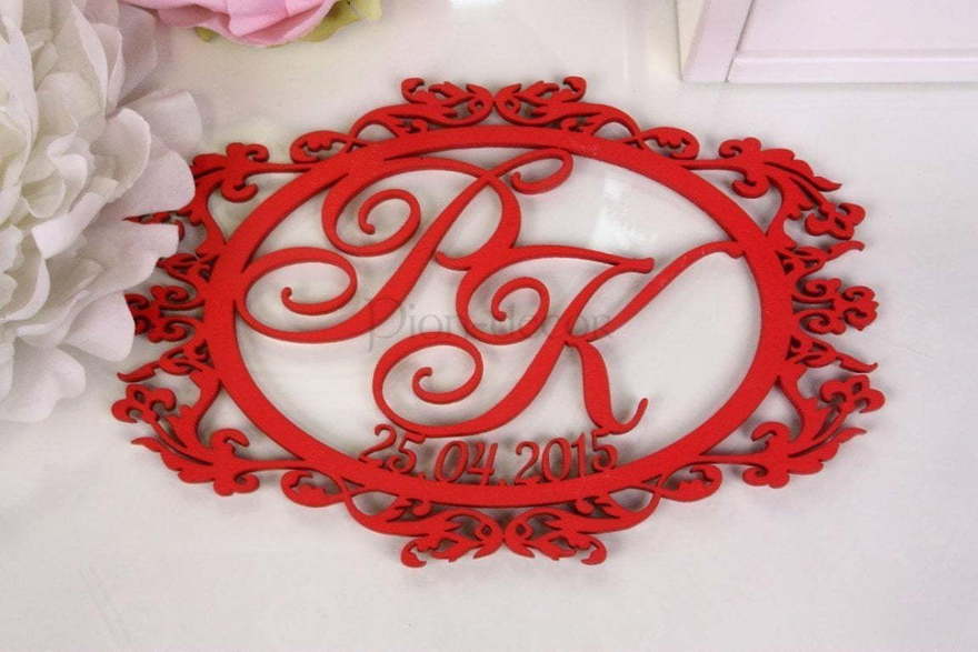 Монограмма жениха и невесты - герб от  2