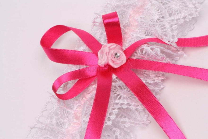 Подвязка с розовой лентой от  2
