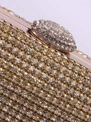 Золотистый клатч с овальной застежкой от  2