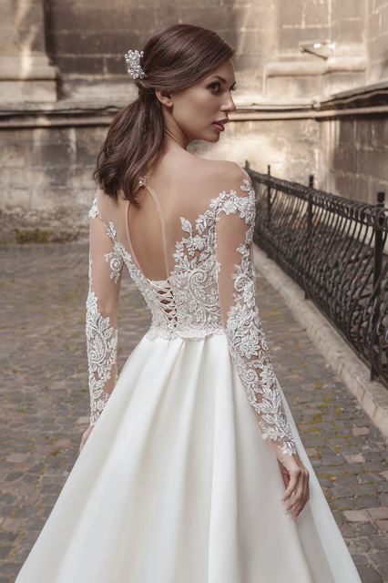 Атласное свадебное платье с рукавами. Силуэт А-силуэт. Цвет Белый / Молочный. Вид 2