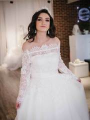 Кружевное свадебное платье с длинным рукавом Nimfa. Силуэт Пышное. Цвет Белый / Молочный. Вид 1