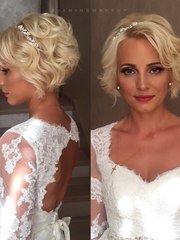 Локоны / Локоны на один бок от Свадебный стилист-визажист Евгения Ващенко 1