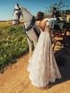 Свадебное платье Arisel. Силуэт А-силуэт. Цвет Белый / Молочный. Вид 2