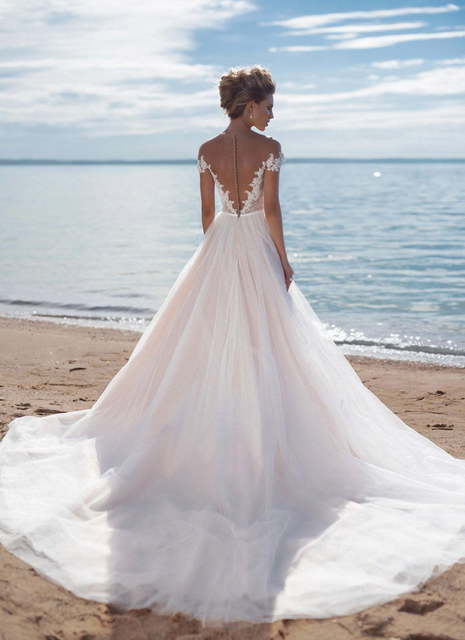 Свадебное платье Kon Tiki. Силуэт А-силуэт, Прямое. Цвет Белый / Молочный, Персик / Оранжевый. Вид 2