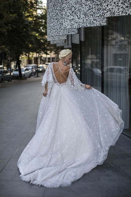 Свадебное платье Glowing Geranium. Силуэт А-силуэт. Цвет Белый / Молочный. Вид 2