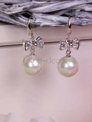 Серьги с цирконами Бантики серебристые из Посеребренная бижутерия от  1